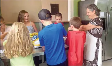  ?? / Sean Williams ?? Local youth learned all about making healthy pies during the latest Cooking Class in Rockmart.