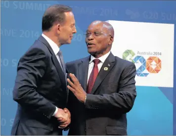  ?? PHOTO: REUTERS ?? Australian Prime Minister Tony Abbott shakes hands with President Jacob Zuma as he officially welcomes leaders to the G20 summit in Brisbane at the weekend.