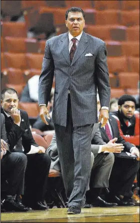  ?? Jae C. Hong The Associated Press ?? Former UNLV standout Reggie Theus got in a “heated verbal altercatio­n” with Cal State Northridge athletic director Brandon Marshall as he was being dismissed as the Matadors’ head coach on Tuesday. Theus was 53-125 in five seasons at the school.