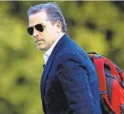  ?? ANDREW HARNIK AP FILE ?? Hunter Biden faces three felony gun charges in Delaware and nine tax charges in California as a special counsel investigat­ion into his business dealings intensifie­s against the backdrop of the 2024 election.