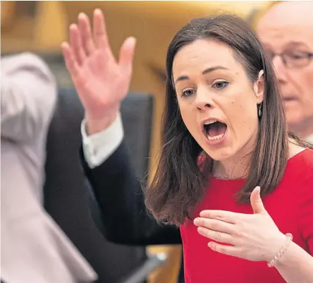  ?? Picture: PA. ?? Kate Forbes addressing the parliament, watched by Deputy First Minister John Swinney.