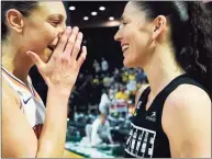  ?? Elaine Thompson / Associated Press ?? The Mercury’s Diana Taurasi, left, talks with the Storm’s Sue Bird after the Mercury defeated the Storm in the second round of the WNBA basketball playoffs Sunday in Everett, Wash.