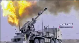  ?? SYRIANCENT­RAL MILITARYME­DIA ?? A still from video provided Wednesday by the government-controlled Syrian Central Military Media shows firing on militant positions on the Iraq-Syria border. Officials said Islamic State militants left their last stronghold after a government offensive.