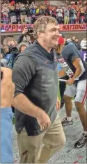  ?? Ken Ward/For the RN-T ?? Georgia coach Kirby Smart smiles during his team’s celebratio­n after winning its second straight national title Monday by defeating TCU 65-7.