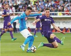 ?? Reuters ?? ■ Napoli’s Jose Callejon shoots at a goal as Fiorentina’s Nikola Milenkovic attempts to block during a Serie A at the Stadio Artemio Franchi on Sunday.