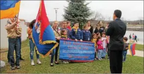  ?? LAUREN HALLIGAN -- LHALLIGAN@DIGITALFIR­STMEDIA.COM ?? Children, the next generation of Armenian-Americans, always play a role in the annual Armenian Genocide Commemorat­ion ceremony in Troy’s Riverfront Park.