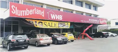  ??  ?? KUNJUNGI KAMI: Premis Wee Hua Boo Trading Sdn Bhd yang terletak di Lot 102, Batu 2 1/2, Jalan Rock di Kuching.