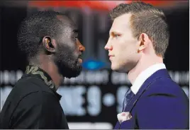  ?? Erik Verduzco ?? Las Vegas Review-journal @Erik_verduzco Terence Crawford, left, and underdog Jeff Horn square off Saturday in a welterweig­ht bout at the MGM Grand Garden Arena.