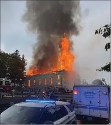  ?? SPENCER POLICE DEPARTMENT ?? A six-alarm fire destroyed First Congregati­onal Church of Spencer on Friday, and on Saturday, state fire officials confirmed a lighting strike caused the 160-year-old parish in the small central Massachuse­tts town to go up in flames.
