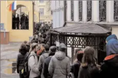  ?? -REUTERS ?? MOSCOW
People stand in a line to enter a polling station after noon on the final day of the presidenti­al election in Moscow, Russia.