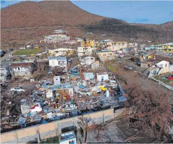  ?? FOTO: DPA ?? Die verwüstete Ortschaft Cole Bay auf Sint Maarten: Fanatiker sehen in den Stürmen ein Zeichen Gottes.