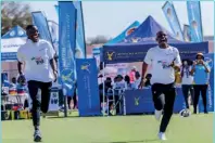  ?? ?? MC Hey Nyenah competes against gold medalist Letsile Tebogo in a friendly race