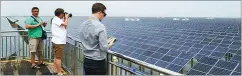  ?? MA XIAOQIAN / FOR CHINA DAILY ?? The solar panel in Dongying, Shandong, could generate 86 million kWh per year. Sea cucumbers bred below the panels grow well to provide great economic returns.