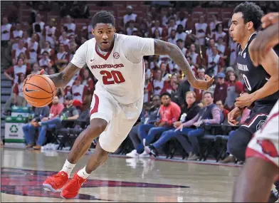  ?? Craven Whitlow/Special to the News-Times ?? On the move: Arkansas' Darious Hall looks to drive during Arkansas' SEC contest against South Carolina earlier this season. Hall had his first double-double of his career in the Razorbacks' win at Mississipp­i on Tuesday.