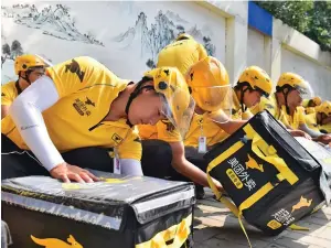  ?? Photo: Xinhua ?? Economic heavyweigh­t Guangdong Province has the largest number of food delivery people, followed by Jiangsu, Zhejiang, Shanghai and Beijing.