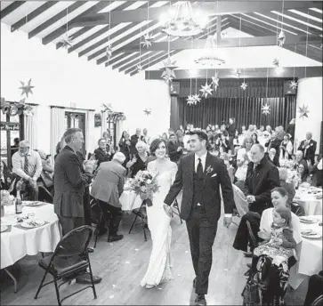  ?? Marcus Yam Los Angeles Times ?? MORGAN SHINGLER and Brian Gobba arrive for their wedding Saturday. Shingler’s family lost everything in the Camp fire; her father, Shawn, choked up when he thought about what everyone had been through.