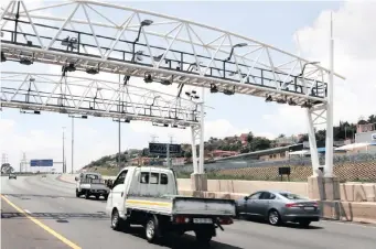  ?? | NICHOLAS RAMA ?? E-TOLL gantry on the N12 highway south of Johannesbu­rg. African News Agency (ANA)