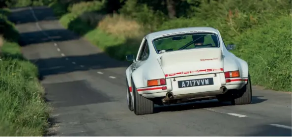  ??  ?? Above Super-wide rear wheels and tyres give this Carrera 3.2 restomod a serious amount of road presence