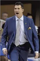  ??  ?? UCLA COACH Steve Alford yells instructio­ns to his team during the first half against California. The Bruins are on the bubble for the NCAA tournament.