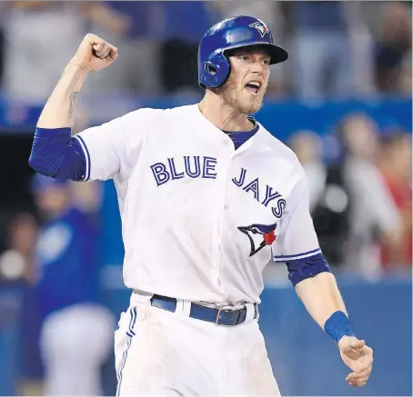  ?? FRANK GUNN/THE CANADIAN PRESS FILES ?? Michael Saunders is back in the Blue Jays organizati­on, with the team announcing Wednesday that the Victoria-born outfielder has signed a minor-league deal and will report to triple-A Buffalo.