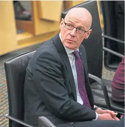  ?? Picture: Shuttersto­ck. ?? Education Secretary John Swinney expects children to spend as close as possible to 50% of their time in school when classes resume in August.