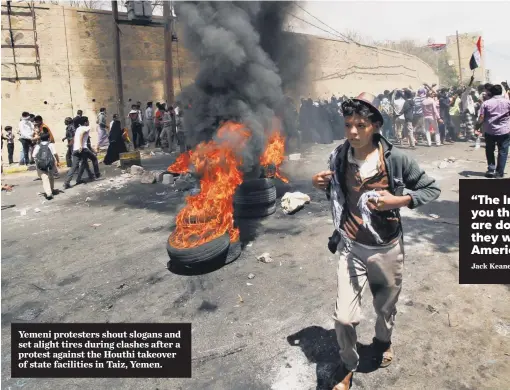  ?? ANIS MAHYOUB, EPA ?? Yemeni protesters shout slogans and set alight tires during clashes after a protest against the Houthi takeover of state facilities in Taiz, Yemen.