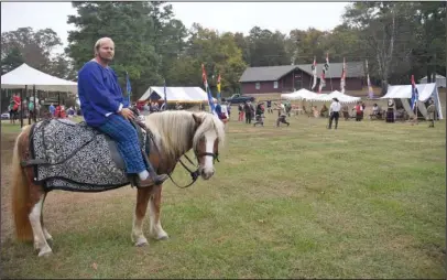  ?? The Sentinel-Record/Mara Kuhn ?? STANDING WATCH: William Nerdin, of Conway, rides Freyja during the 32nd annual Diamond Wars at Camp Couchdale Saturday.