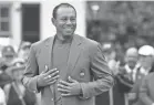  ?? MICHAEL MADRID/USA TODAY SPORTS ?? Tiger Woods has worn the green jacket at the end of five Masters.