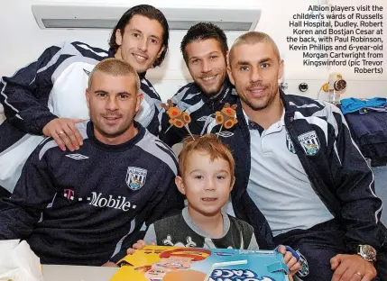  ?? ?? Albion players visit the children’s wards of Russells Hall Hospital, Dudley. Robert Koren and Bostjan Cesar at the back, with Paul Robinson, Kevin Phillips and 6-year-old Morgan Cartwright from Kingswinfo­rd (pic Trevor Roberts)