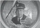  ??  ?? Tom Hanks captains a Navy destroyer in “Greyhound.” NIKO TAVERNISE/ APPLE