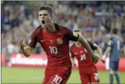  ?? JOHN RAOUX — THE ASSOCIATED PRESS ?? Christian Pulisic celebrates after scoring against Panama during a World Cup qualifying match on Oct. 6 in Orlando, Fla.