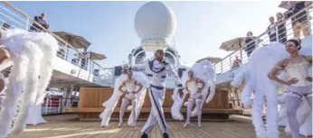  ??  ?? Star Breeze hosts a French spectacle during a “Life of the Glitterati” event on its top deck.