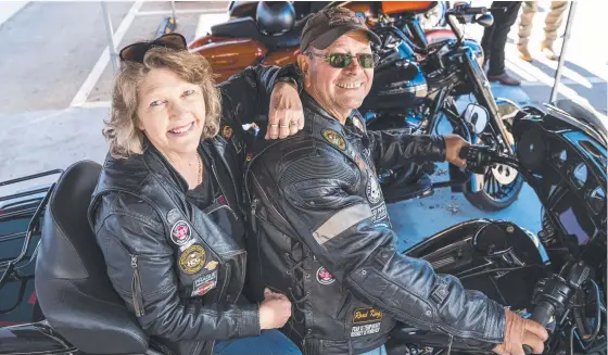  ??  ?? READY TO CRUISE: Ron and Kaja Schneider on their Harley Davidson Ultra which they will ride in Sunday’s Cruise for Cancer. Picture: Kevin Farmer