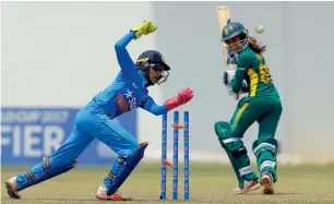  ?? PTI ?? South Africa’s Shabnim Ismail is bowled as India’s Sushma Verma looks on. —