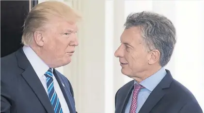  ??  ?? UNA LLAMADA TELEFÓNICA GESTIONADA HACE 15 DÍAS Gestión por el comercio. Donald Trump y Mauricio Macri. en su último encuentro en Berlín.