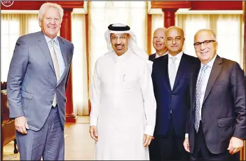  ?? (AP) ?? In this photo released by the Saudi Press Agency, SPA, Saudi Minister of Energy, Industry and Mineral Resources Engineer Khalid Al-Falih (second left), poses with chairman and CEO of General Electric Co Jeffrey Immelt (left), and others after they meet...