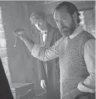  ?? PROVIDED BY JAAP BUITENDIJK ?? Dumbledore ( Jude Law, right ) and Newt ( Eddie Redmayne) in “Fantastic Beasts.”
