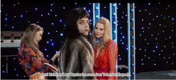  ??  ?? Rami Malek and Lucy Boynton in a scene from ‘Bohemian Rhapsody’.