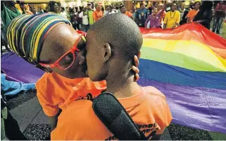  ?? /Waldo Swiegers/ Sunday Times ?? Intimate kiss: Melanie Judge’s book says black lesbians bear the brunt of violence against the LGBT community