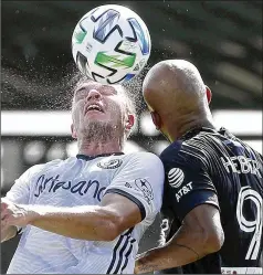  ?? STEPHEN M. DOWELL / ORLANDO SENTINEL ?? Philadelph­ia Union player Kai Wagner (left) and New York City FC’s Heber Araujo compete for the ball during the MLS is Back tournament at Walt Disney World on Thursday.