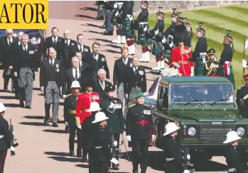  ?? HANNAH MCKAY / WPA POOL / GETTY IMAGES ?? Members of the royal family walk behind the coffin of Prince Philip on Saturday during the funeral for the Duke of Edinburgh at Windsor Castle. While William and Harry walked apart from each other during the procession, the
brothers were later afforded an opportunit­y to chat face to face for the first time in more than a year.