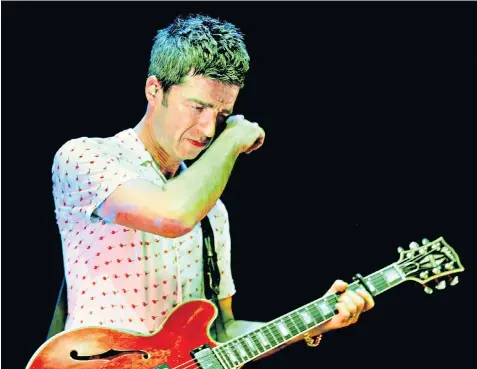  ??  ?? Don’t look back in anger: Noel Gallagher, above, sheds a tear during his performanc­e