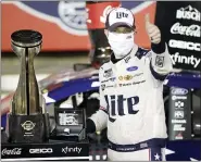  ?? GERRY BROOME — THE ASSOCIATED PRESS ?? Brad Keselowski celebrates after winning the NASCAR Cup Series auto race at Charlotte Motor Speedway early Monday, May 25, 2020, in Concord, N.C.