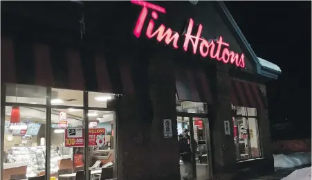  ??  ?? A Tim Hortons restaurant in Newcastle, Ont. Restaurant Brands Internatio­nal is the parent company.