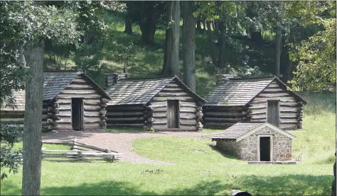  ?? WIKIMEDIA COMMONS ?? Cabins at Valley Forge were built by George Washington’s troops during the Revolution­ary War.