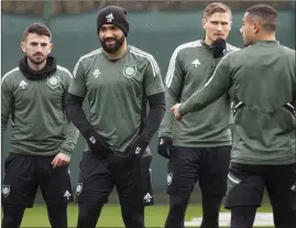  ?? ?? Celtic defender Cameron Carter- Vickers, second- left, in training