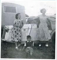  ??  ?? My sisters in summer frocks and me in shorts at Seasalter in around 1952.