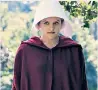  ??  ?? Chaste: Offred (Elisabeth Moss) in The Handmaid’s Tale