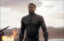  ?? MARVEL STUDIOS — DISNEY VIA AP ?? This image released by Disney and Marvel Studios’ shows Chadwick Boseman in a scene from “Black Panther.”