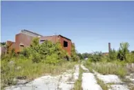  ?? STAFF PHOTO BY C.B. SCHMELTER ?? The mill site in Lupton City is seen last month.